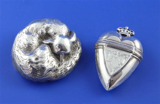 An Edwardian silver novelty paperweight modelled as a sleeping fox, gross 147 grams.